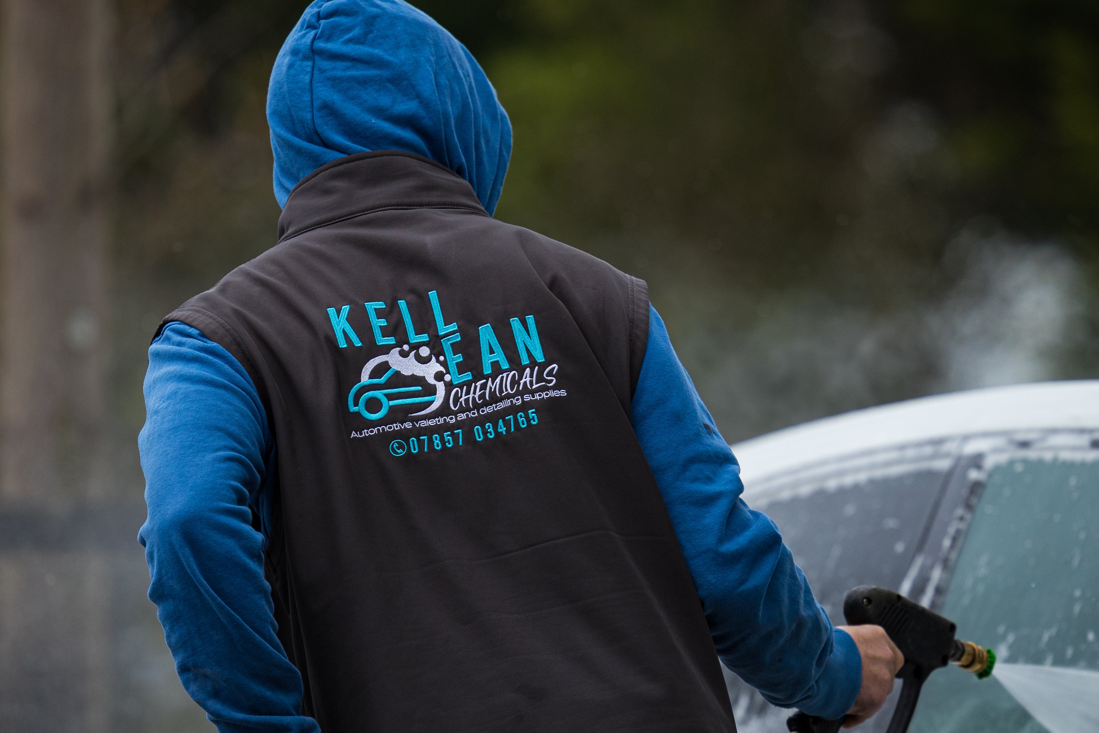 Back of a workers jacket with the Kellean Chemicals brand logo & details embroidered